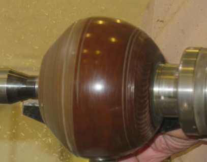 The start of a lidded bowl from a bowling ball